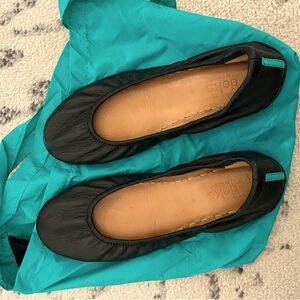 Black Tieks flats